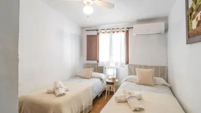 Cama o camas de una habitación en La Viña del Pájaro Casabermeja by Ruralidays