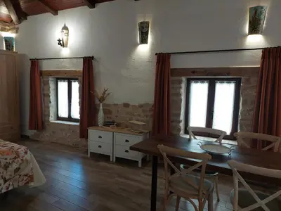 Zona de estar de Apartamentos Turísticos El AOVE