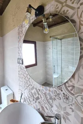Un baño de Apartamentos Turísticos El AOVE