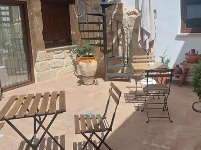 Un balcón o terraza de Apartamentos Turísticos El AOVE
