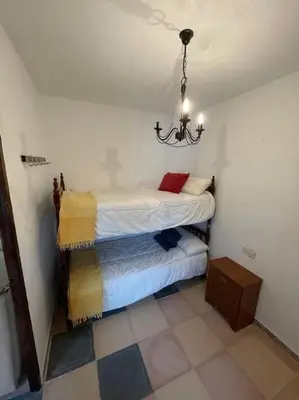 Cama o camas de una habitación en Villa María, casa rural en Cazalla de la Sierra.