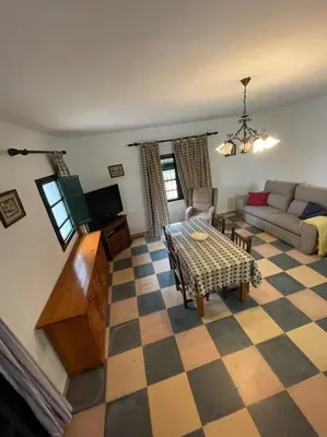 Zona de estar de Villa María, casa rural en Cazalla de la Sierra.
