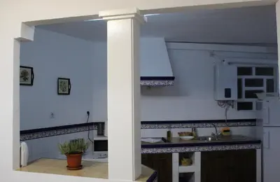 Una cocina o zona de cocina en Al pie del Camarín con parking gratis