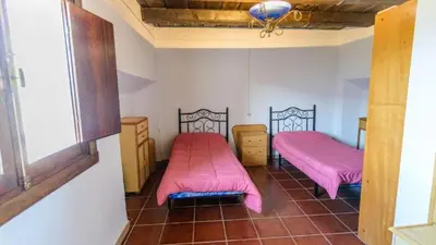 Cama o camas de una habitación en Cortijo Vaquero Rural Loja by Ruralidays