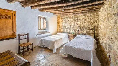 Cama o camas de una habitación en Las Nogueras de Montefrío by Ruralidays