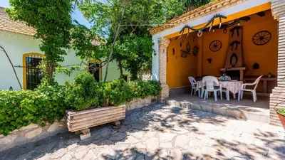 Jardín al aire libre en Cortijo Coracho Osuna by Ruralidays