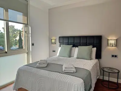 Cama o camas de una habitación en Victoria Cordoba Center
