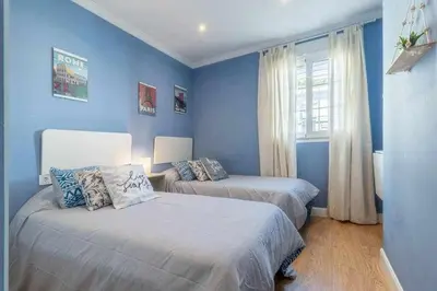 Cama o camas de una habitación en Apartamento 3 en Estadio del Sevilla, 8 plazas y m
