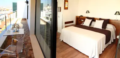 Cama o camas de una habitación en Hotel Don Paco