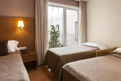 Cama o camas de una habitación en Hotel Don Paco