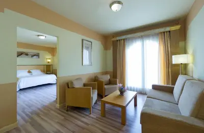 Cama o camas de una habitación en Hotel Fuente Las Piedras