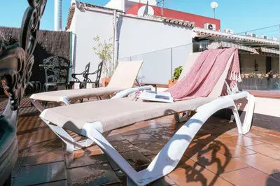 Un balcón o terraza de Apartamento con encanto en patio sevillano (202)