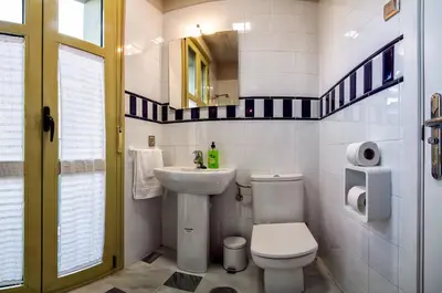 Un baño de DescubreHome Macarena Town Center