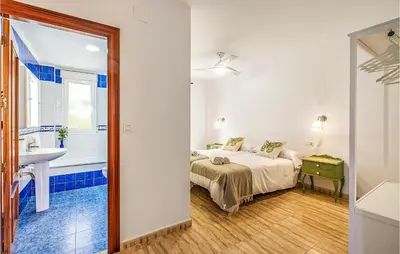 Cama o camas de una habitación en Stunning Air Conditioned House