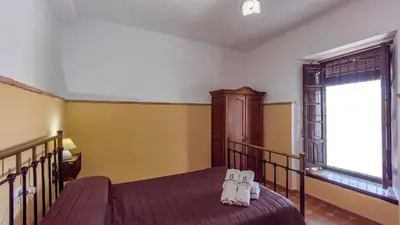 Cama o camas de una habitación en Cortijo El Llano Priego de Córdoba by Ruralidays