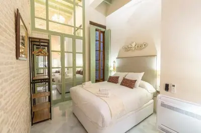 Cama o camas de una habitación en Judería de Sevilla I - Luxury Apartments.
