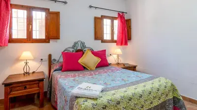 Cama o camas de una habitación en Casa Saladillo Valle de Abdalajís by Ruralidays