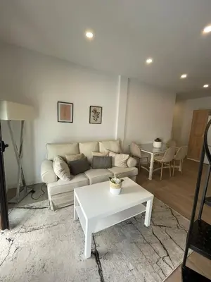 Zona de estar de Precioso Apartamento céntrico con piscina