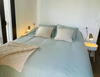 Cama o camas de una habitación en Precioso Apartamento céntrico con piscina