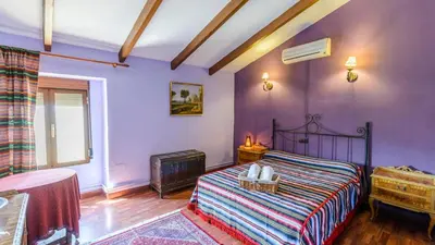 Cama o camas de una habitación en Cortijo El Encinar de Cobo Martos by Ruralidays