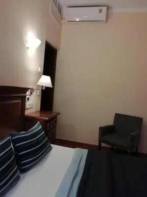 Cama o camas de una habitación en Hotel Plateros