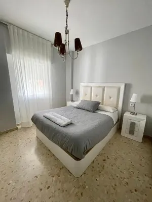 Cama o camas de una habitación en Piso AZORES-FIBES
