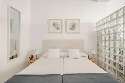 Cama o camas de una habitación en Encantador apartamento en el Centro
