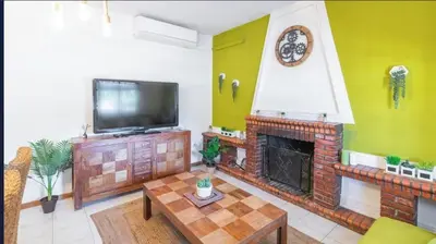 Una televisión o centro de entretenimiento en VILLA CUQUI