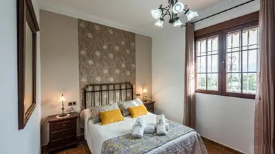Cama o camas de una habitación en La Villa del Lago Iznájar by Ruralidays