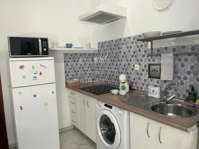 Una cocina o zona de cocina en Apartamento lux capilla