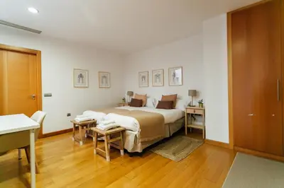 Cama o camas de una habitación en Alohamundi San Martín