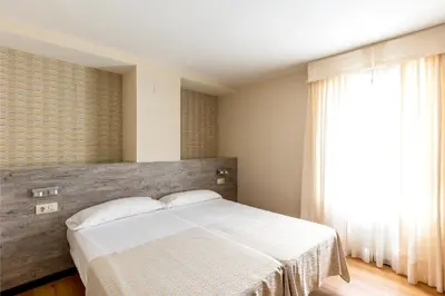 Cama o camas de una habitación en Colectia Hotel Santa Lucía
