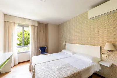 Cama o camas de una habitación en Colectia Hotel Santa Lucía