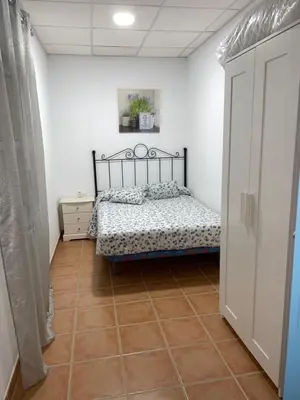 Cama o camas de una habitación en La casa del olivo