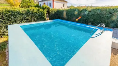 Piscina en o cerca de Huerta Nueva Cuevas del Becerro by Ruralidays