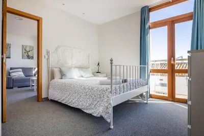 Cama o camas de una habitación en Casa Xanadu Carmona - Apartments in villa with panoramic views
