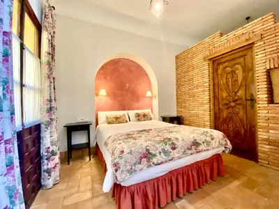 Cama o camas de una habitación en El Rincón de las Descalzas