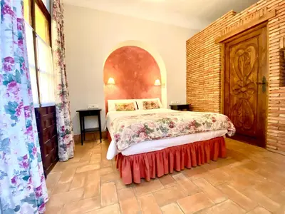 Cama o camas de una habitación en El Rincón de las Descalzas