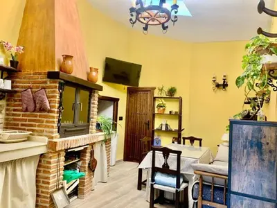 Una televisión o centro de entretenimiento en Vivienda Rincon de Mágina
