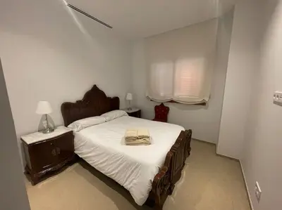 Cama o camas de una habitación en Apartamento con jardín y piscina en Córdoba