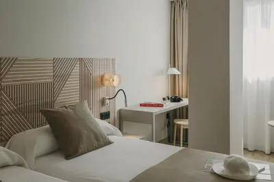 Cama o camas de una habitación en Hotel El Mirador