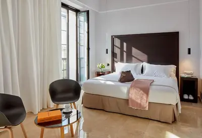 Cama o camas de una habitación en Hotel Posada del Lucero