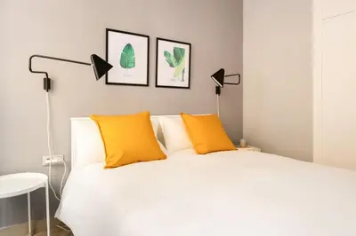 Cama o camas de una habitación en Mia Suite. Center of Seville