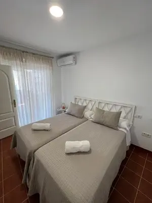 Cama o camas de una habitación en BALCÓN DE CLAUDIO MARCELO