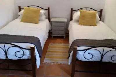 Cama o camas de una habitación en El Nogal at Cortijo de Los Cien Canos