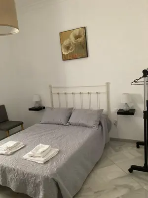 Cama o camas de una habitación en Duplex Santamaria