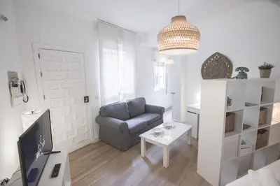 Una televisión o centro de entretenimiento en RentalSevilla Santa Rufina