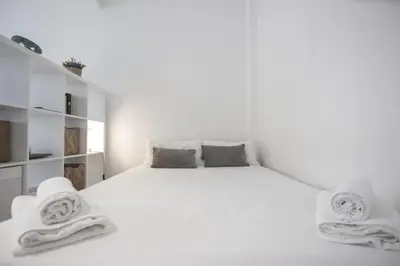 Cama o camas de una habitación en RentalSevilla Santa Rufina