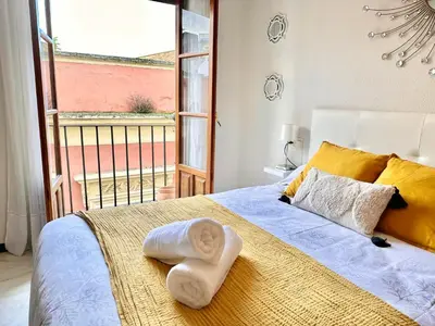 Cama o camas de una habitación en El Balcón del Templo Romano