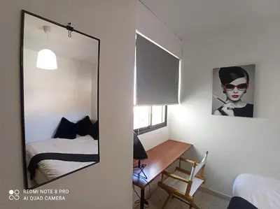 Cama o camas de una habitación en Apartamento baños Árabes